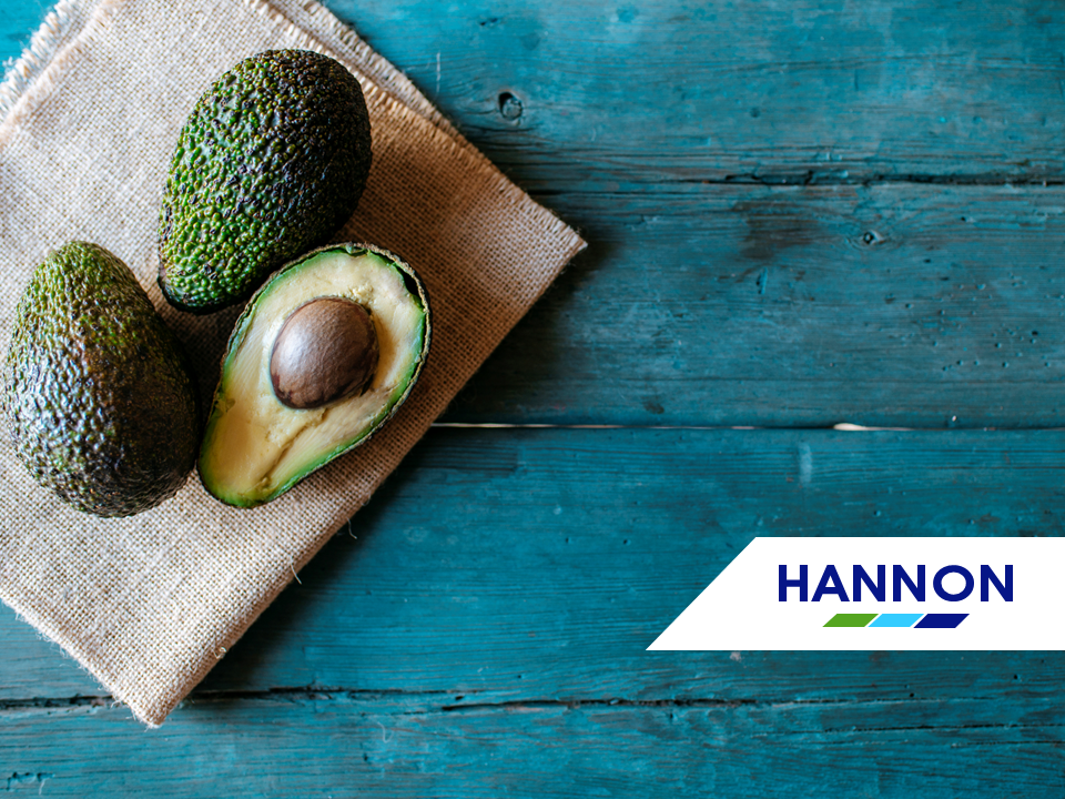 Avocados on a wooden table