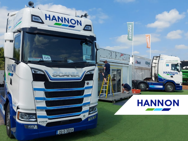 Week 19 - Bonus Blog - HANNON hard at work getting ready for Balmoral Show Lorry on grass in front of trailer