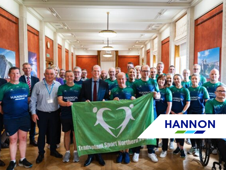 Group of people holding a flag