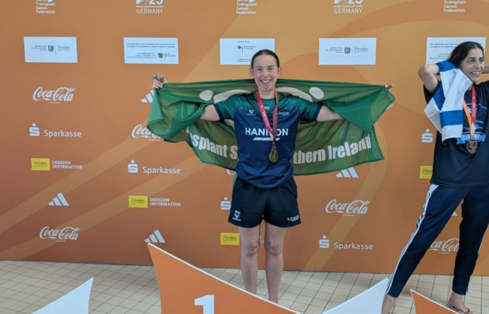 Woman with gold medal
