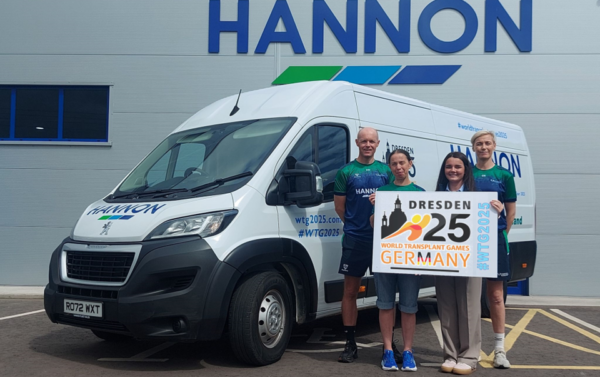 People beside a van