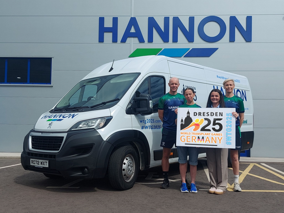 People beside a van